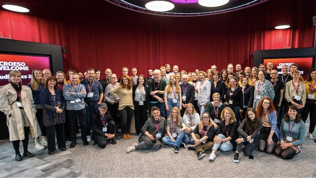 Group shot of attendees at IFC AudioDocs 2022