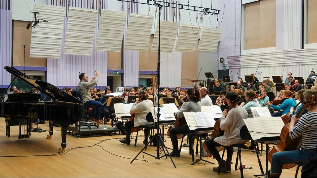 Ben Gernon rehearsing with the orchestra at the BBC Philharmonic’s broadcast home in Salford, MediaCityUK