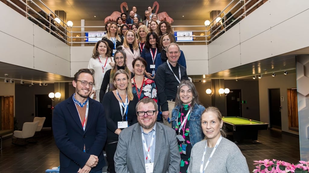 Participants gather on a staircase at the EBU Academy Workshop 2024, in Reykjavik