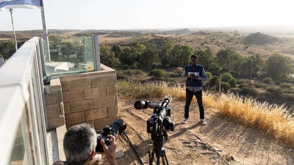 Members of the press work in a position with a viewpoint over the Gaza Strip on May 24, 2024 in Southern Israel, Israel. 
