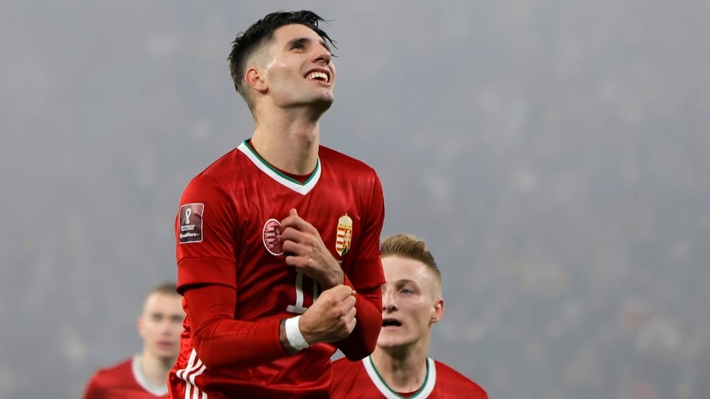 This is a photo of Dominik Szoboszlai of Hungary celebrating his goal during the FIFA World Cup 2022 Qatar qualifying match between Hungary and San Marino at Puskas Arena on November 12, 2021 in Budapest, Hungary.